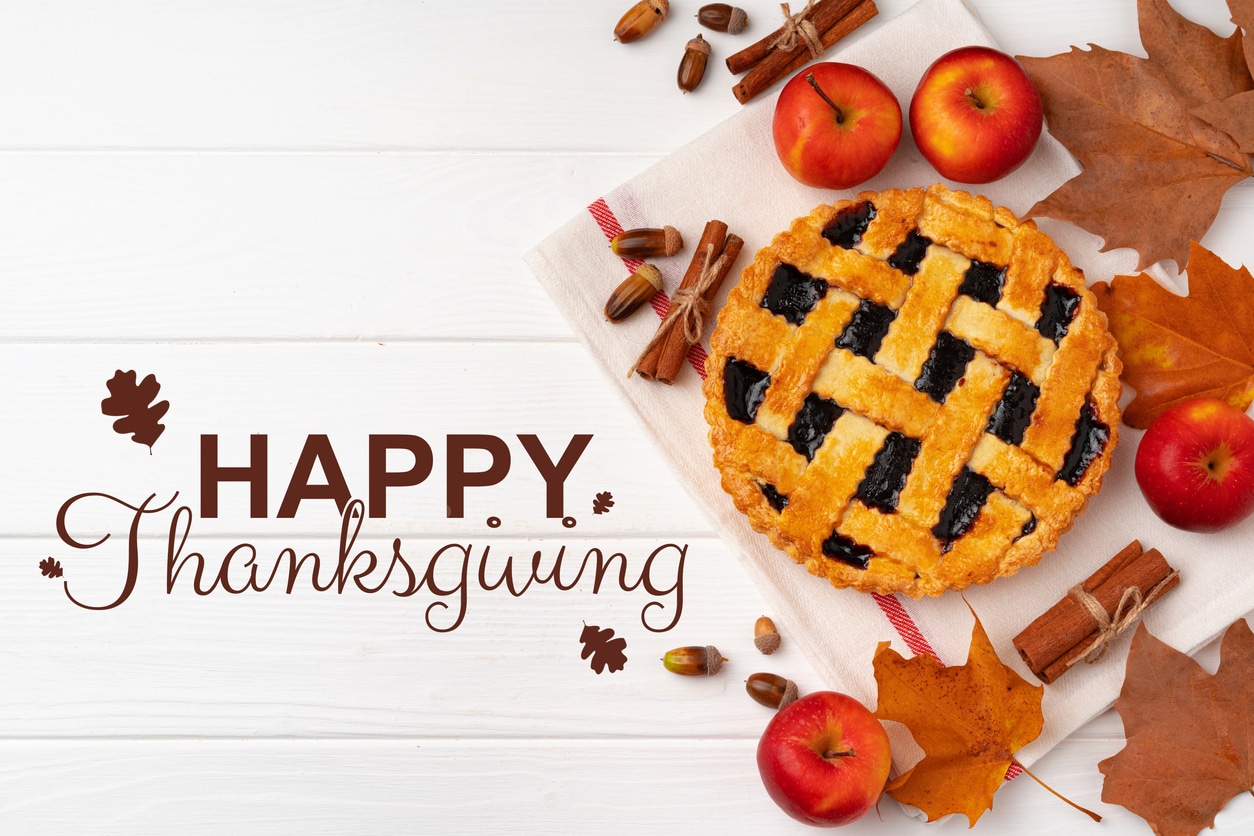Celebrating Thanksgiving with a festive pie and seasonal decorations on a cozy table.